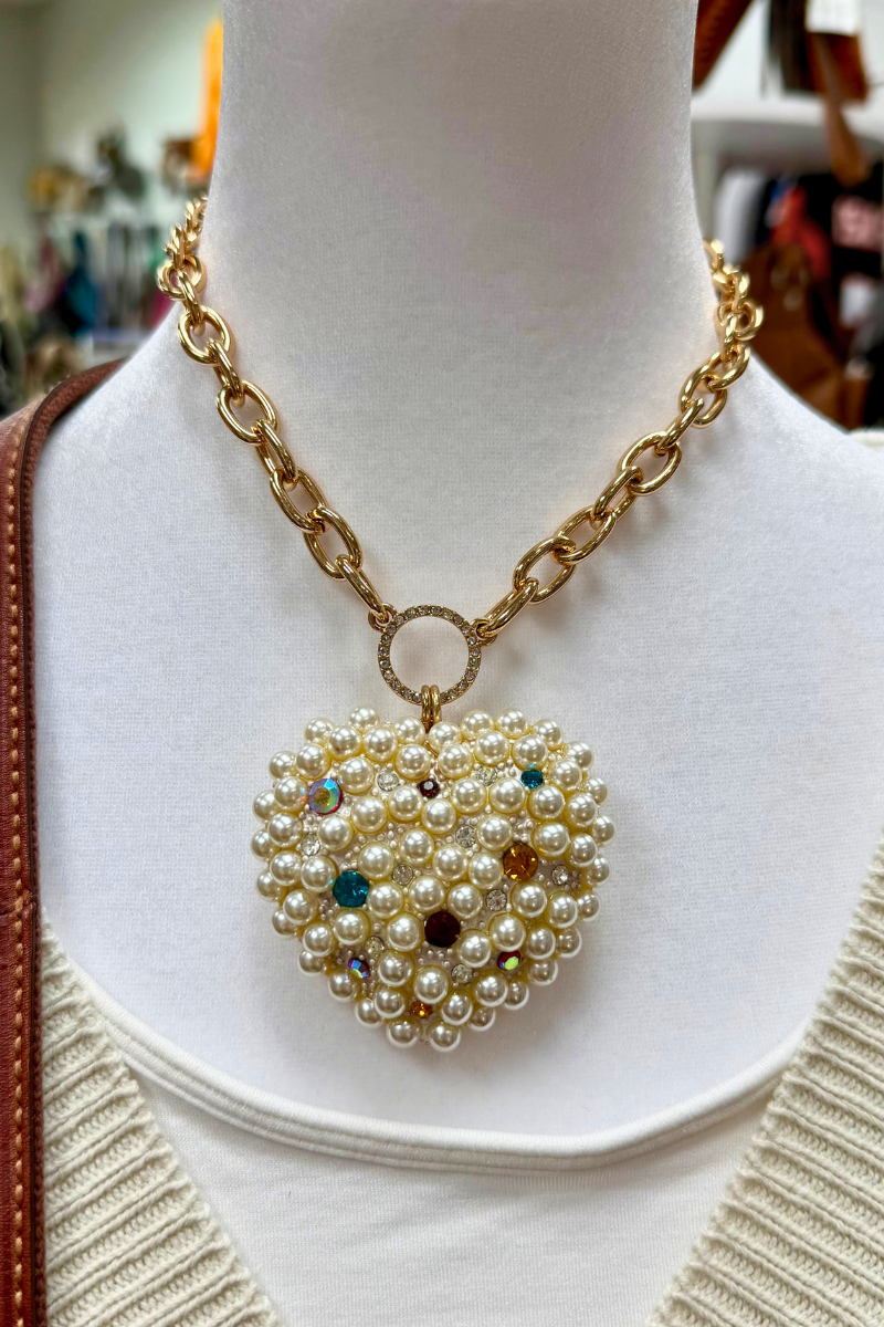 Betsey Johnson Pop Heart Pearl Necklace featuring a large gold-tone heart pendant adorned with faux pearls and scattered crystal accents.